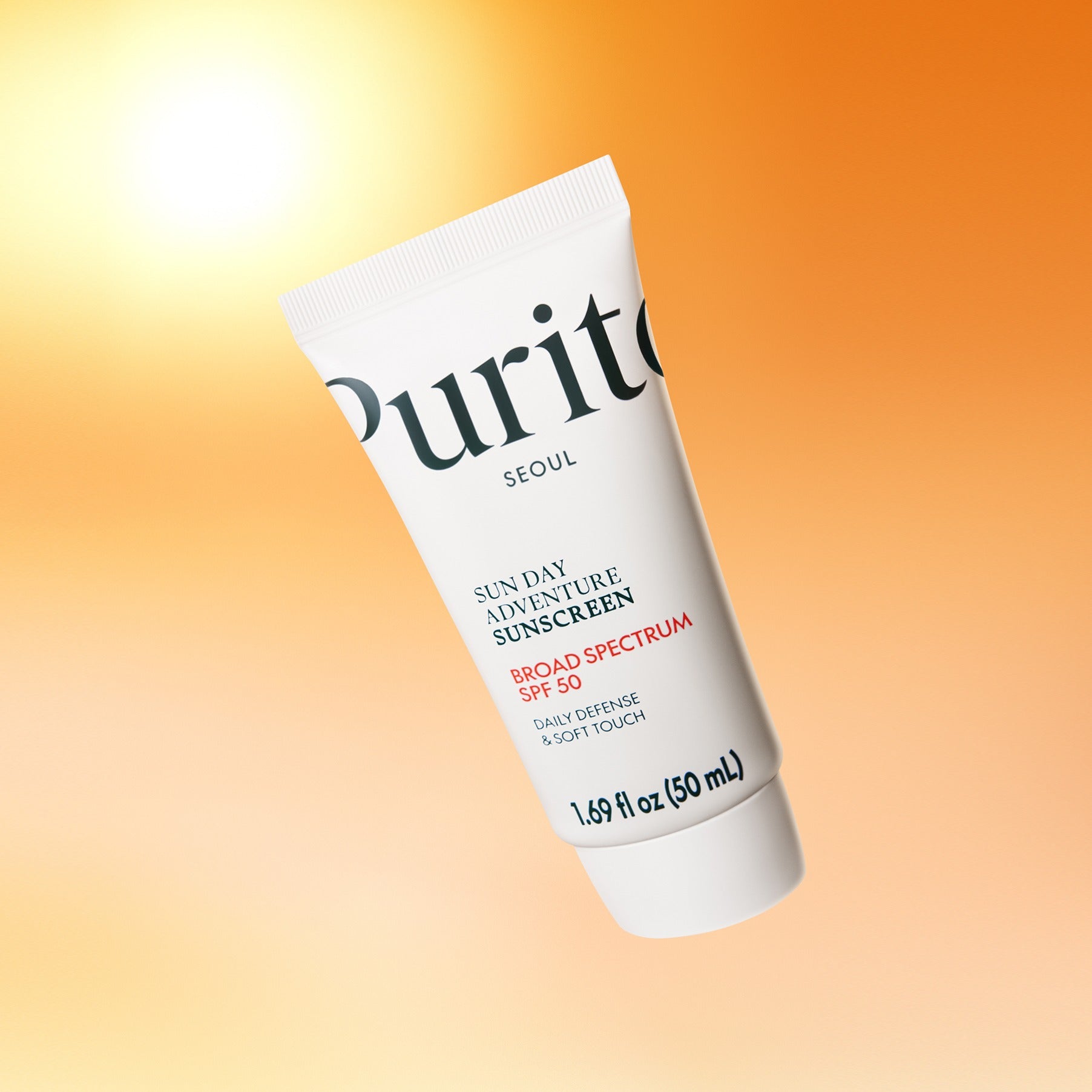 PURITO Sunday Adventure Sunscreen SPF50 50ml against sunset background