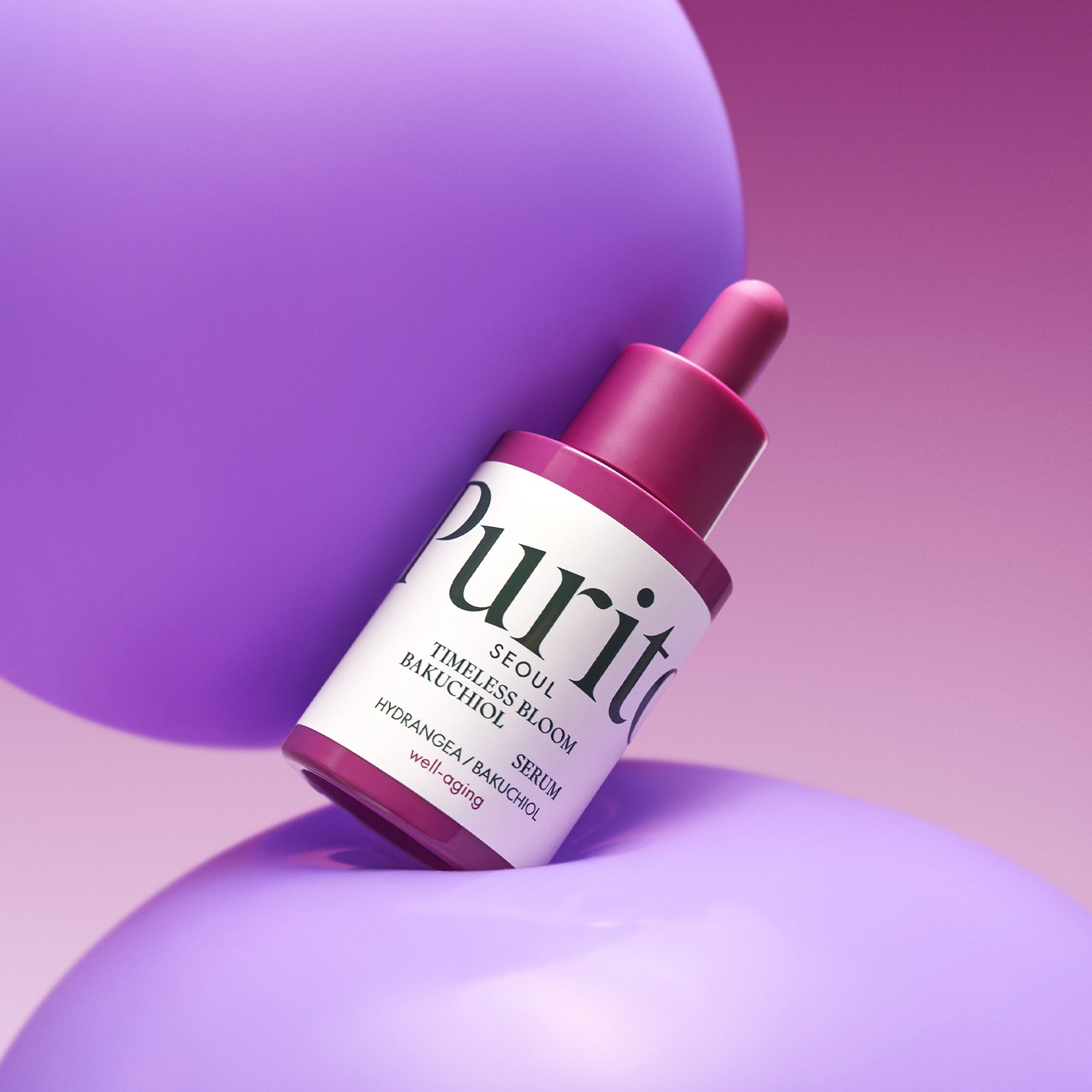 PURITO Timeless Bloom Bakuchiol Serum 30ml on purple background, focus on skincare packaging design.