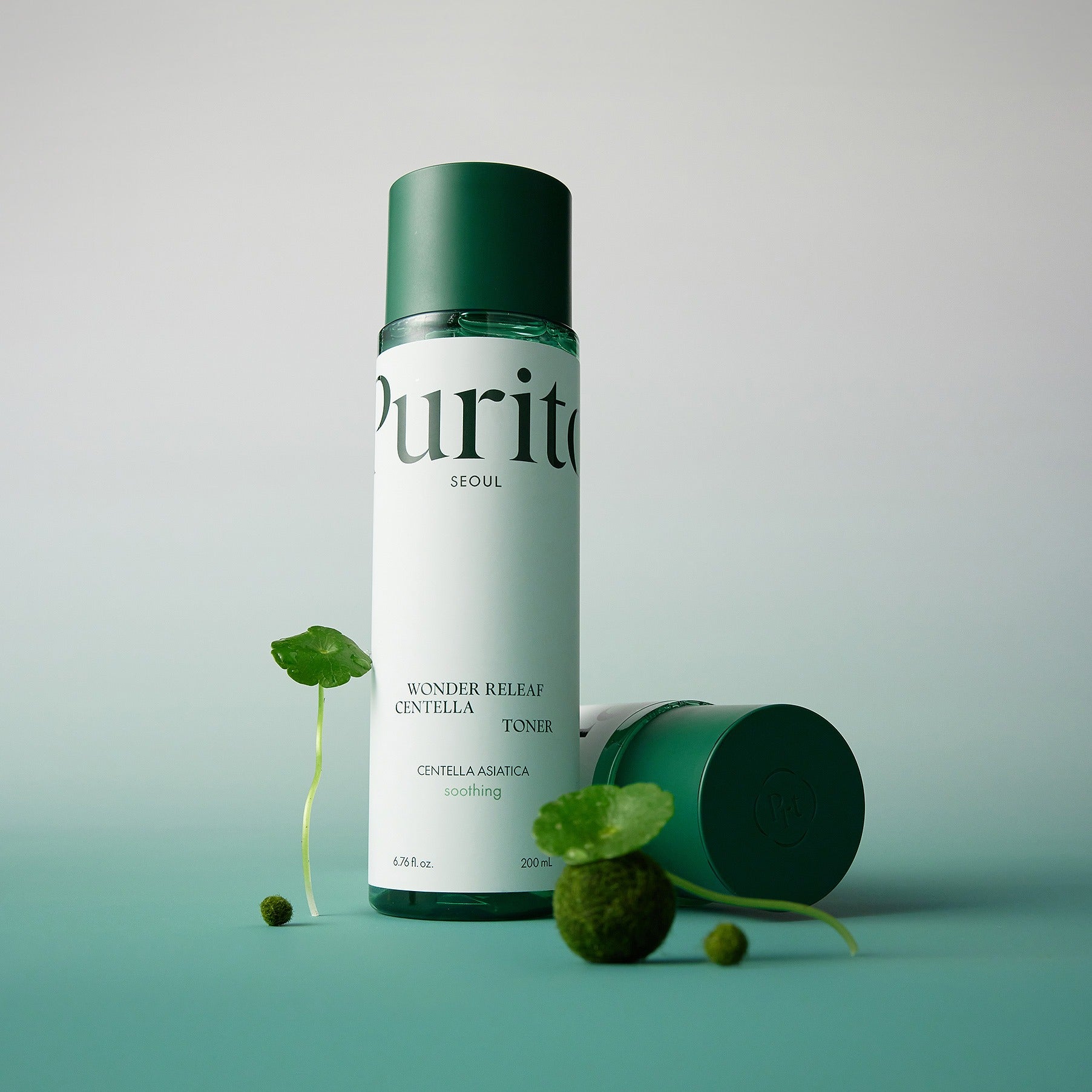 PURITO Wonder Relief Centella Toner 200ml bottle with plant elements on a green background