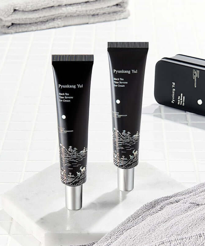 PYUNKANG YUL Black Tea Time Reverse Eye Cream 25ml tubes on white surface for anti-aging skincare