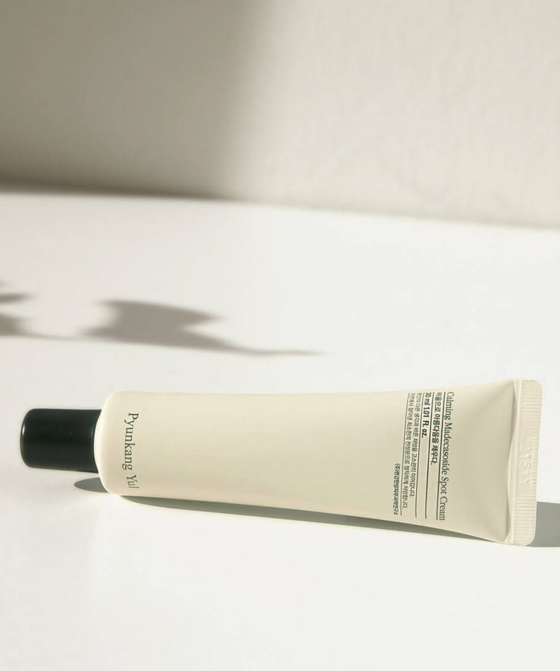 PYUNKANG YUL Calming Madecassoside Spot Cream 30ml tube on a white background.