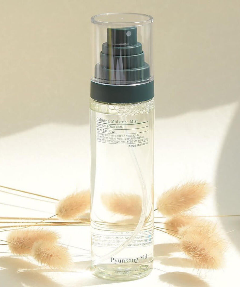 PYUNKANG YUL Calming Moisture Mist 100ml bottle with elegant packaging and natural backdrop