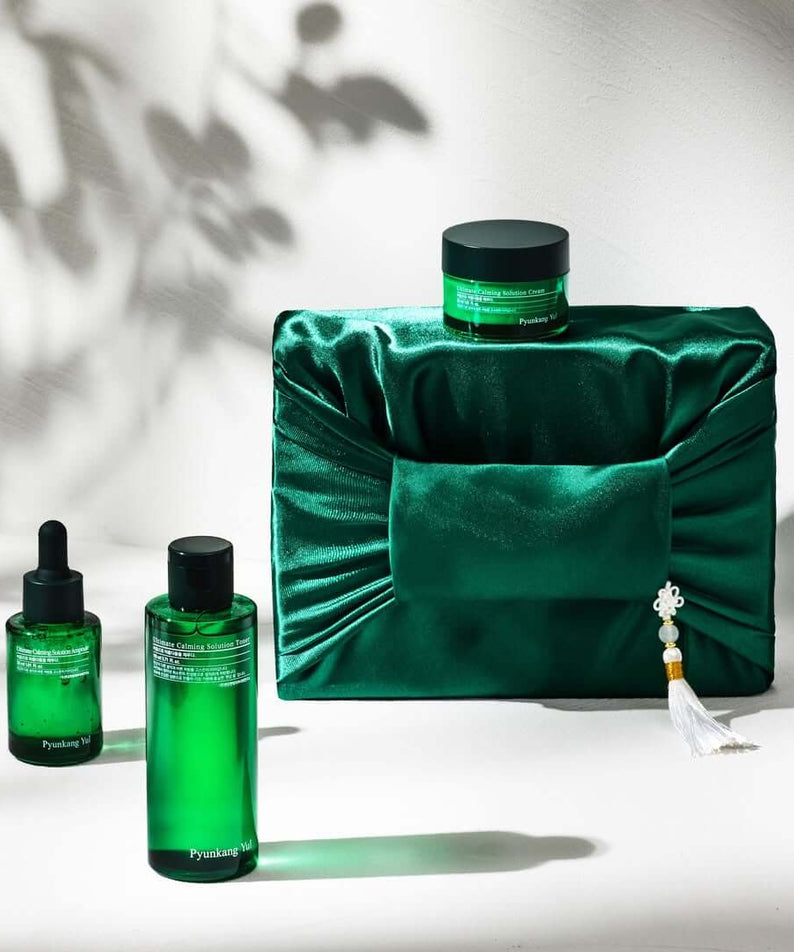 PYUNKANG YUL Ultimate Bojagi Gift Set displayed elegantly with green packaging and beauty products.