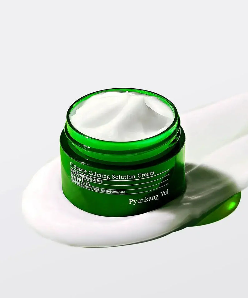 PYUNKANG YUL Ultimate Soothing Solution Cream 30ml in green jar on white background, open lid with visible cream texture.