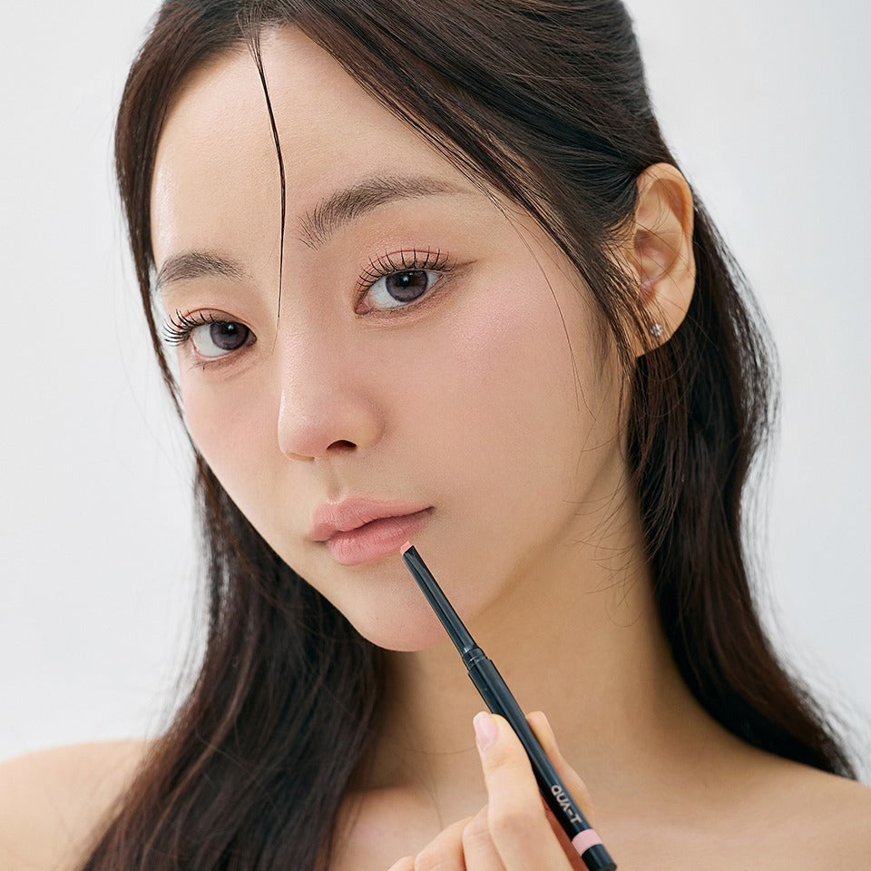Model applying QUA-T NEW My Mood Lip Liner, showcasing soft and natural makeup look.
