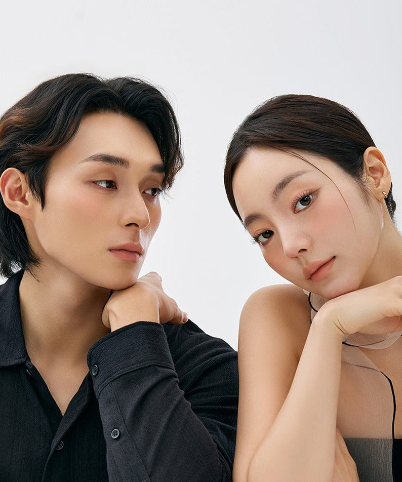 Two people posing with natural makeup, highlighting the effects of QUA-T NEW My Mood Lip Liner.