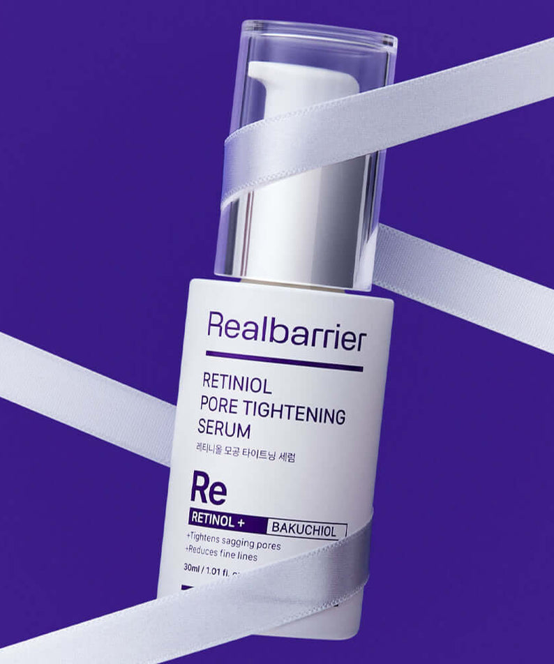 REAL BARRIER Retinol Pore Tightening Serum 30ml bottle on purple background with white ribbon