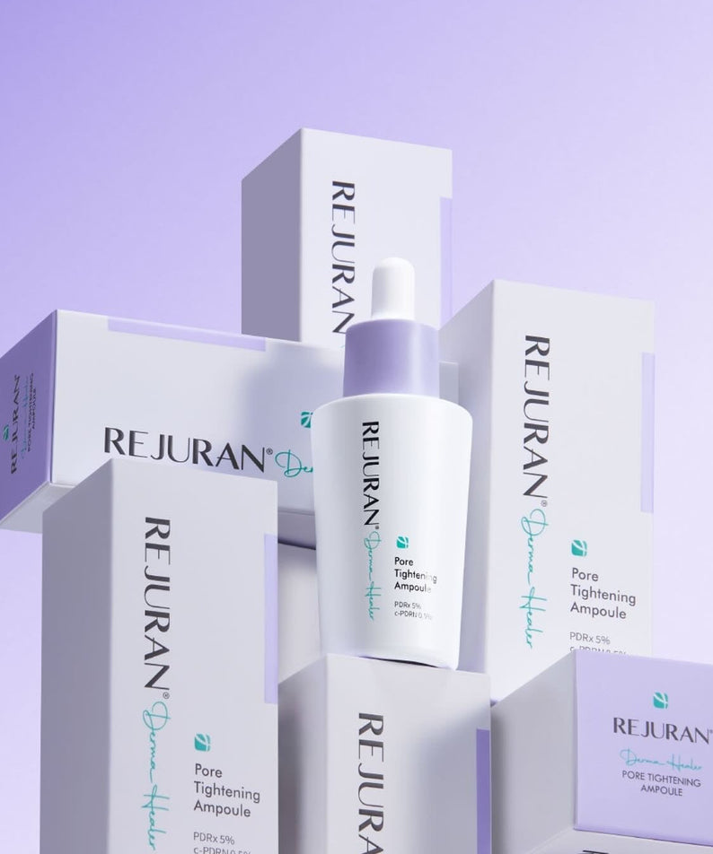 REJURAN Derma Healer Pore Tightening Ampoule 30ml with boxes on a purple background