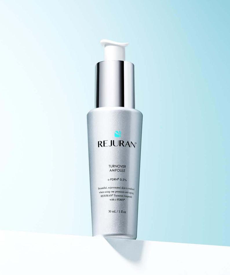 REJURAN Turnover Ampoule 30ml bottle on light blue background.