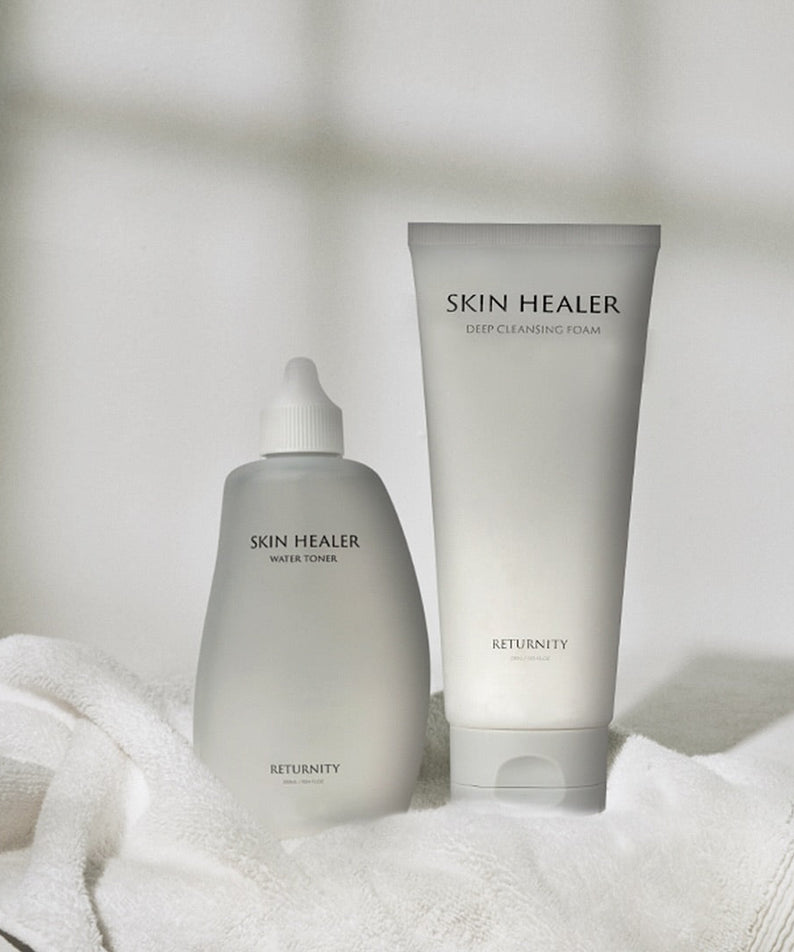RETURNITY Skin Healer Water Toner 300ml and Deep Cleansing Foam on a white towel