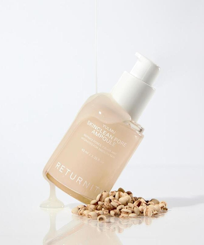 RETURNITY Yumu Pore Ampoule 40ml bottle with grains on white background