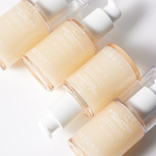 RETURNITY Yumu Pore Ampoule 40ml bottles displayed diagonally with white pumps, highlighting skincare product features.