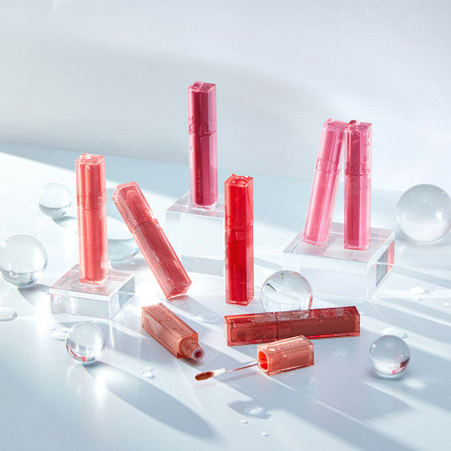 ROMAND Dew-Ful Water Tint (#01 to #13) lip tint collection displayed with glossy finish packaging and elegant design.