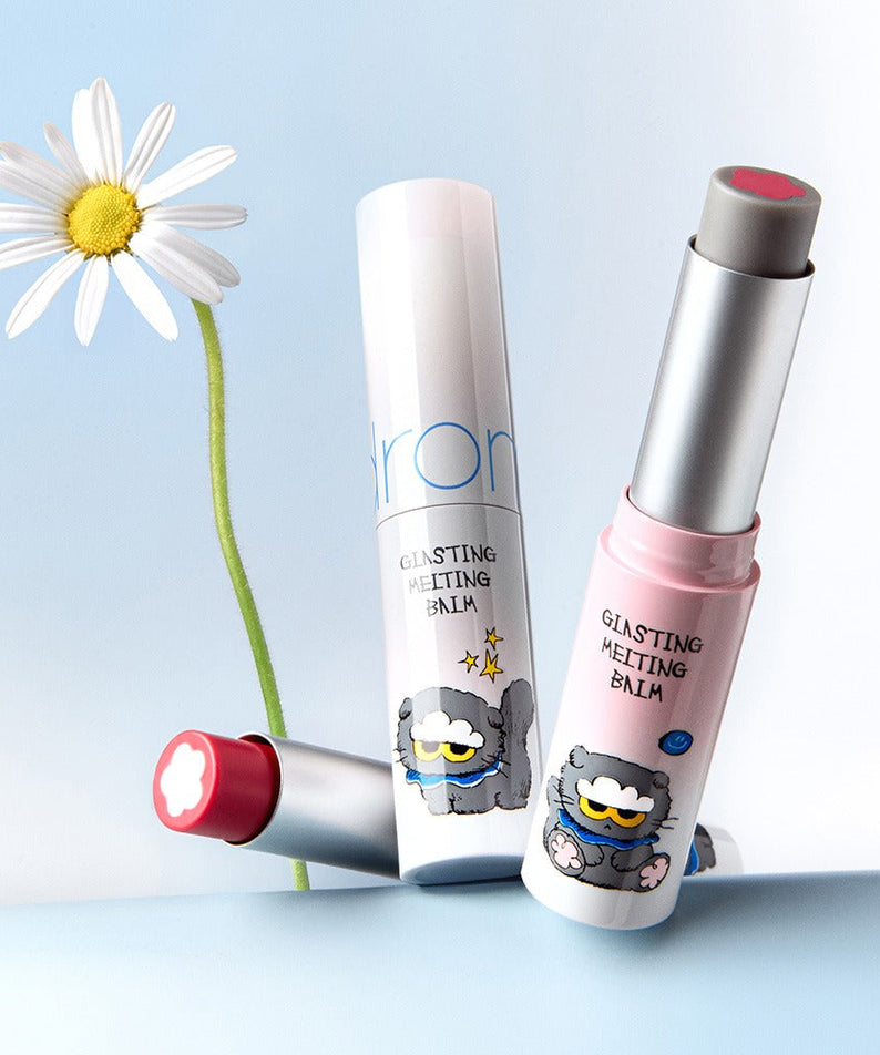 ROMAND x Joanne Friends Glasting Melting Balm displayed with colorful packaging and flower backdrop.