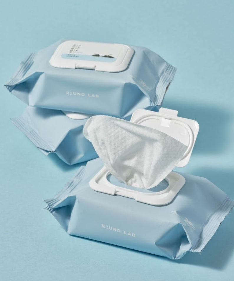 Pack of ROUND LAB 1025 Dokdo Cleansing Tissues on a blue background