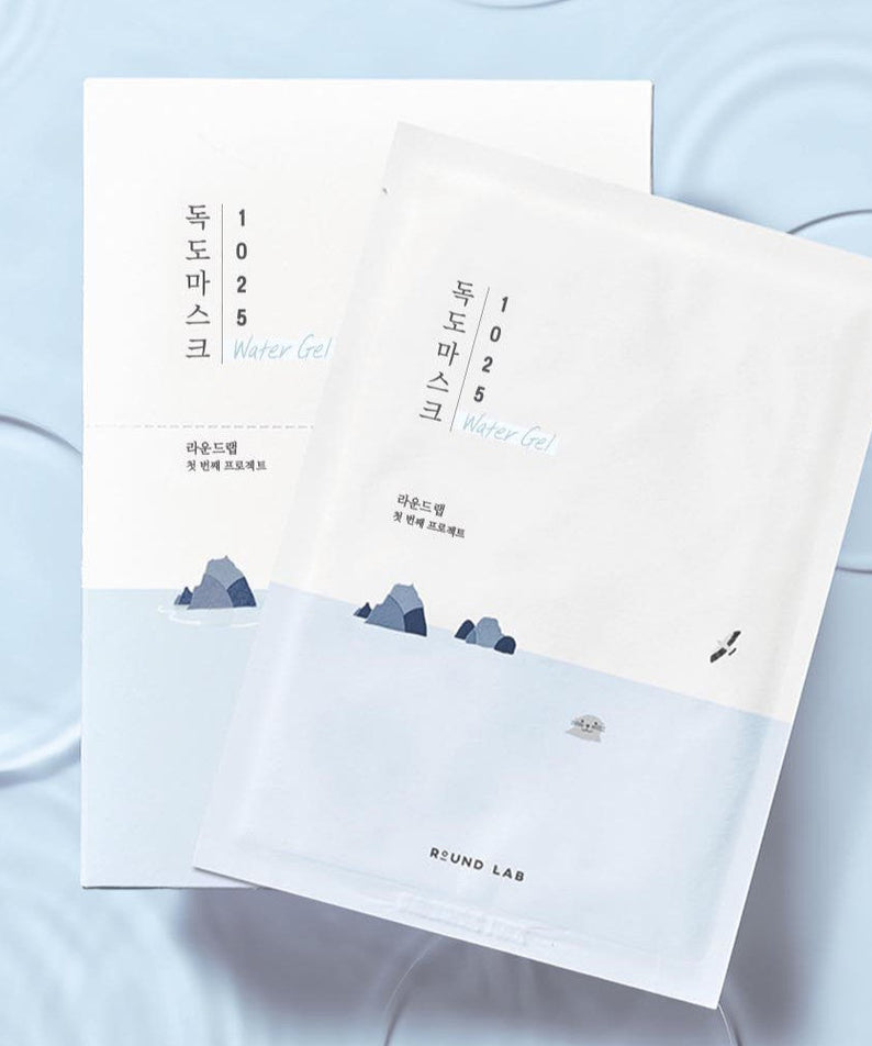 Packaging of ROUND LAB 1025 Dokdo Hydrating Water Gel Mask on a textured blue background