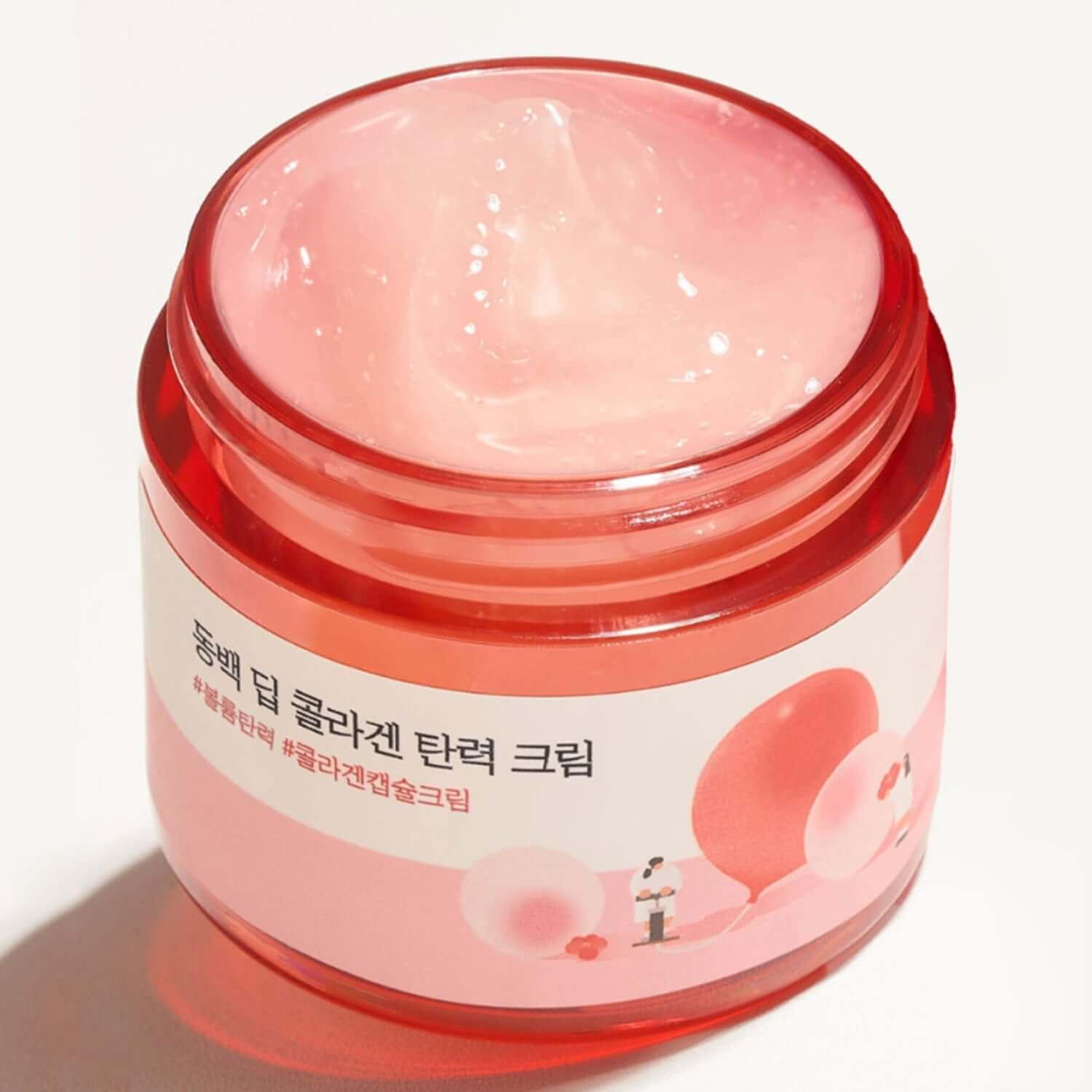 ROUND LAB Dongbaek Deep Collagen Elasticity Cream 50ml jar with pink cream, enhancing skin elasticity and hydration.