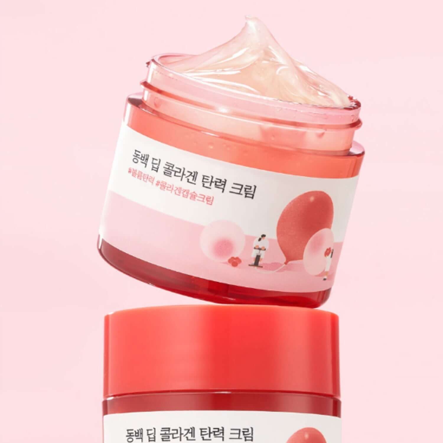 ROUND LAB Dongbaek Deep Collagen Elasticity Cream 50ml jar with open lid showcasing smooth cream texture.