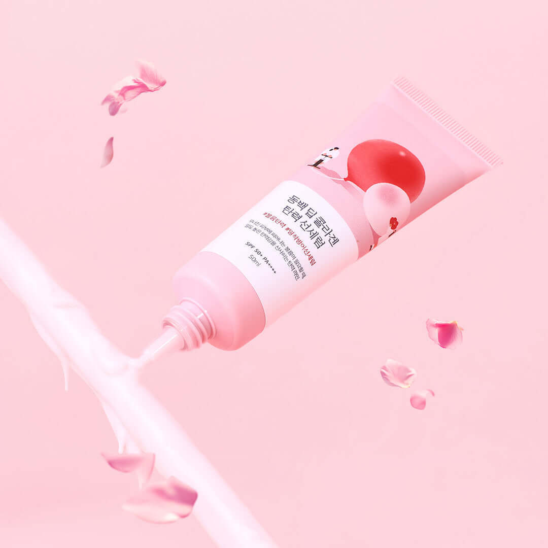 ROUND LAB Dongbaek Deep Collagen Elasticity Sun Serum 50ml with floral design on a pink background