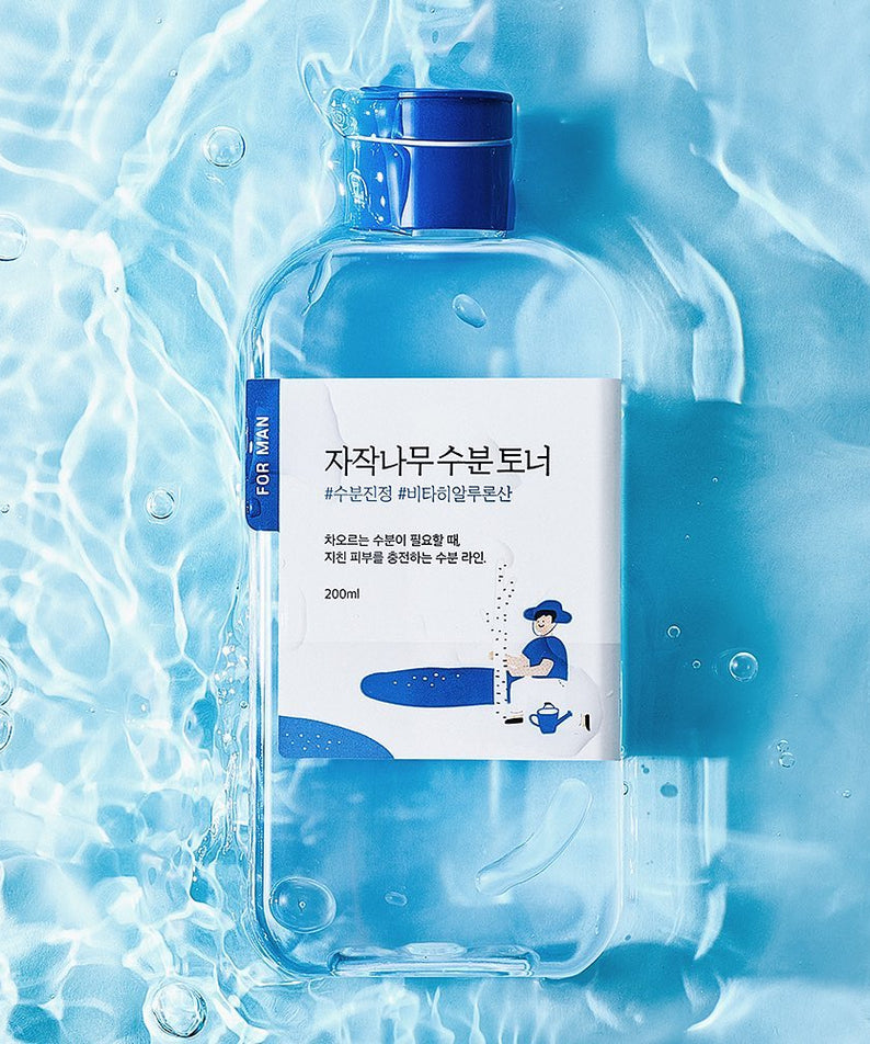 ROUND LAB For Men Birch Moisture Toner 200ml - Gentleman Korea product image showing clear blue bottle on water background