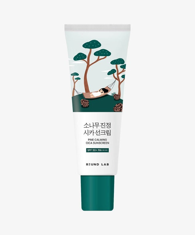 Image of ROUND LAB Pine Calming Cica Sunscreen 40ml tube with nature-themed design.