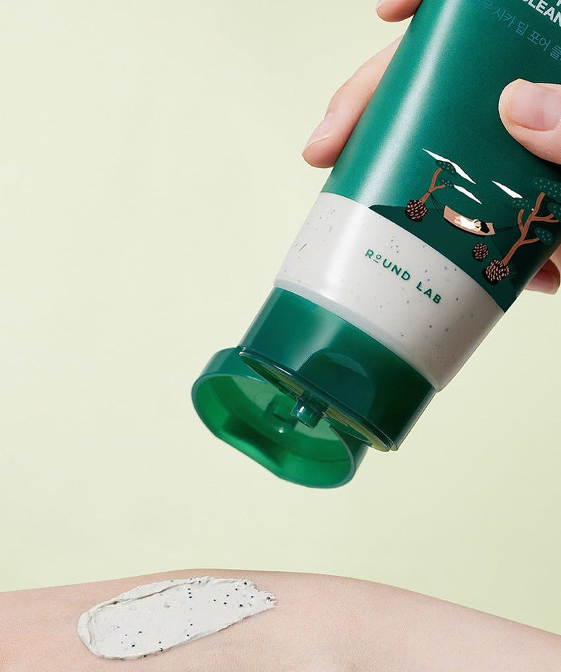 ROUND LAB Pine Cica Deep Pore Clay Pack Cleanser 150ml being applied on skin