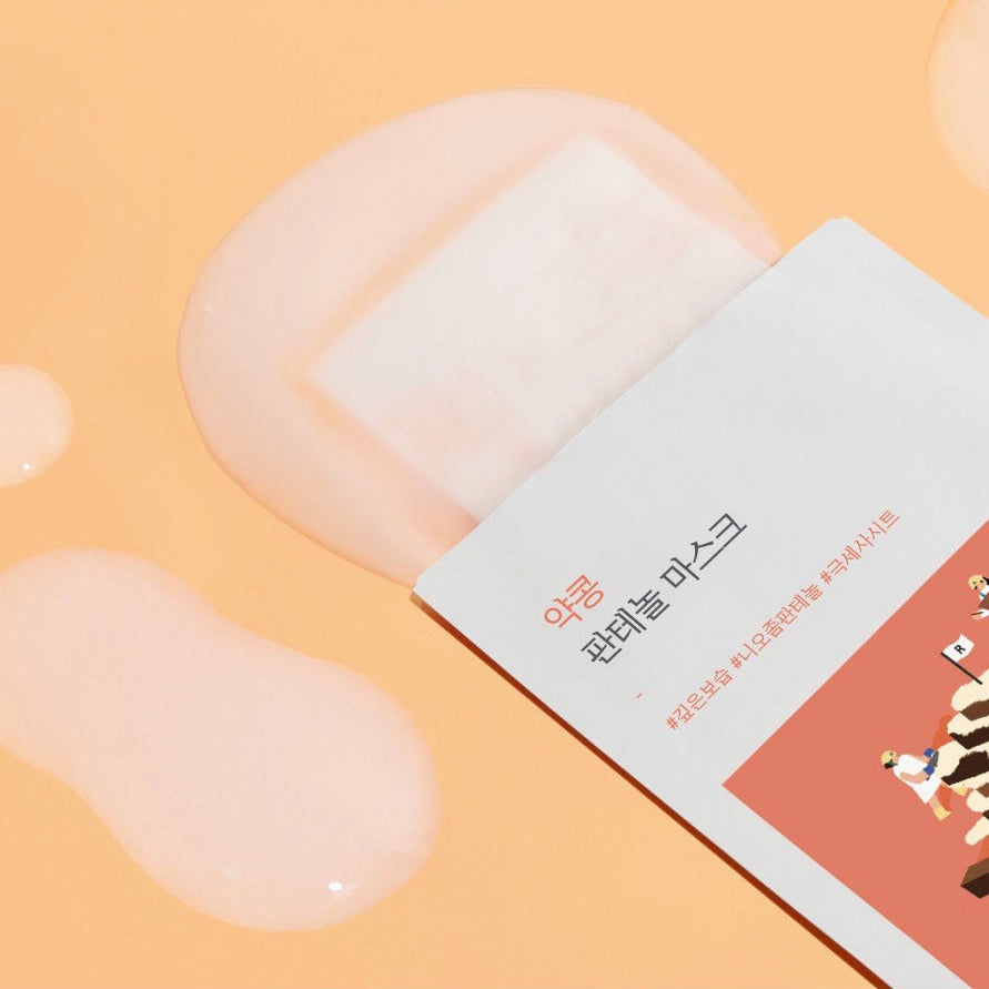 ROUND LAB Yakkong Panthenol Mask (10 sheets) with pink essence on orange background.