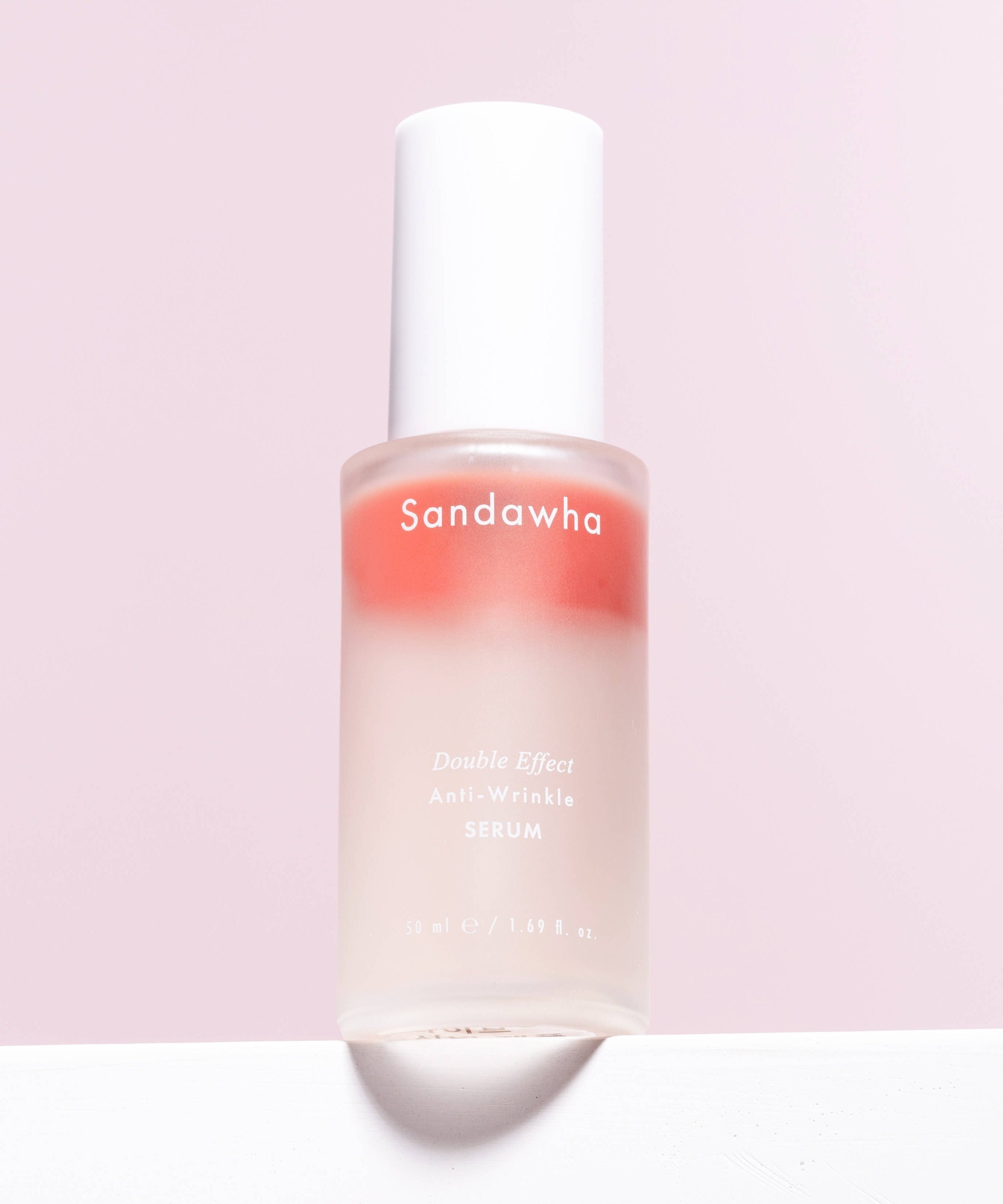 SANDAWHA Double Effect Anti Wrinkle Serum 50ml bottle on pink background