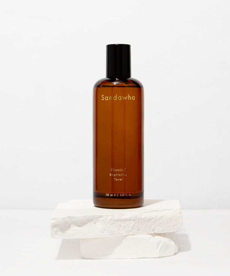 SANDAWHA Vitamin C Whitening Toner 150ml bottle on white backdrop, designed for skin brightening and hydration.