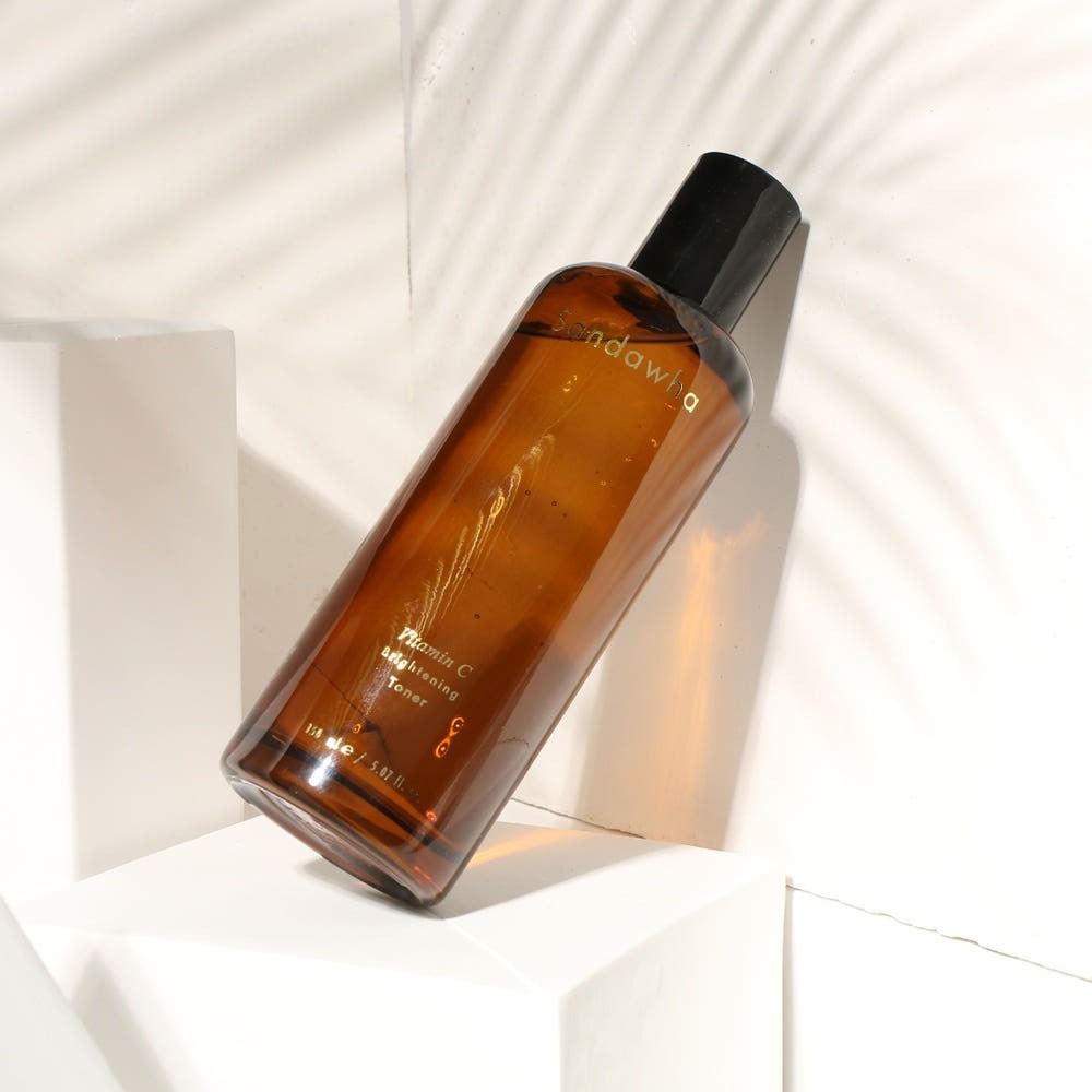 Bottle of SANDAWHA Vitamin C Whitening Toner 150ml on white background