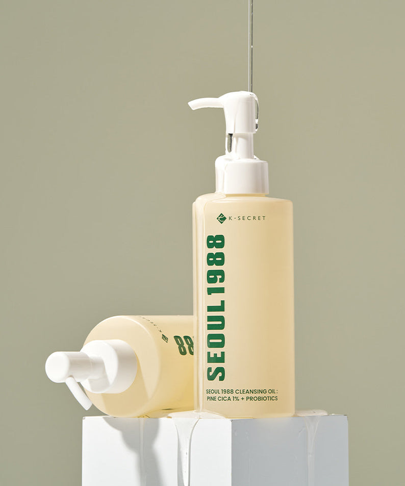 SEOUL 1988 Pine Cica Cleansing Oil bottle displayed on a pedestal, showcasing skincare product.
