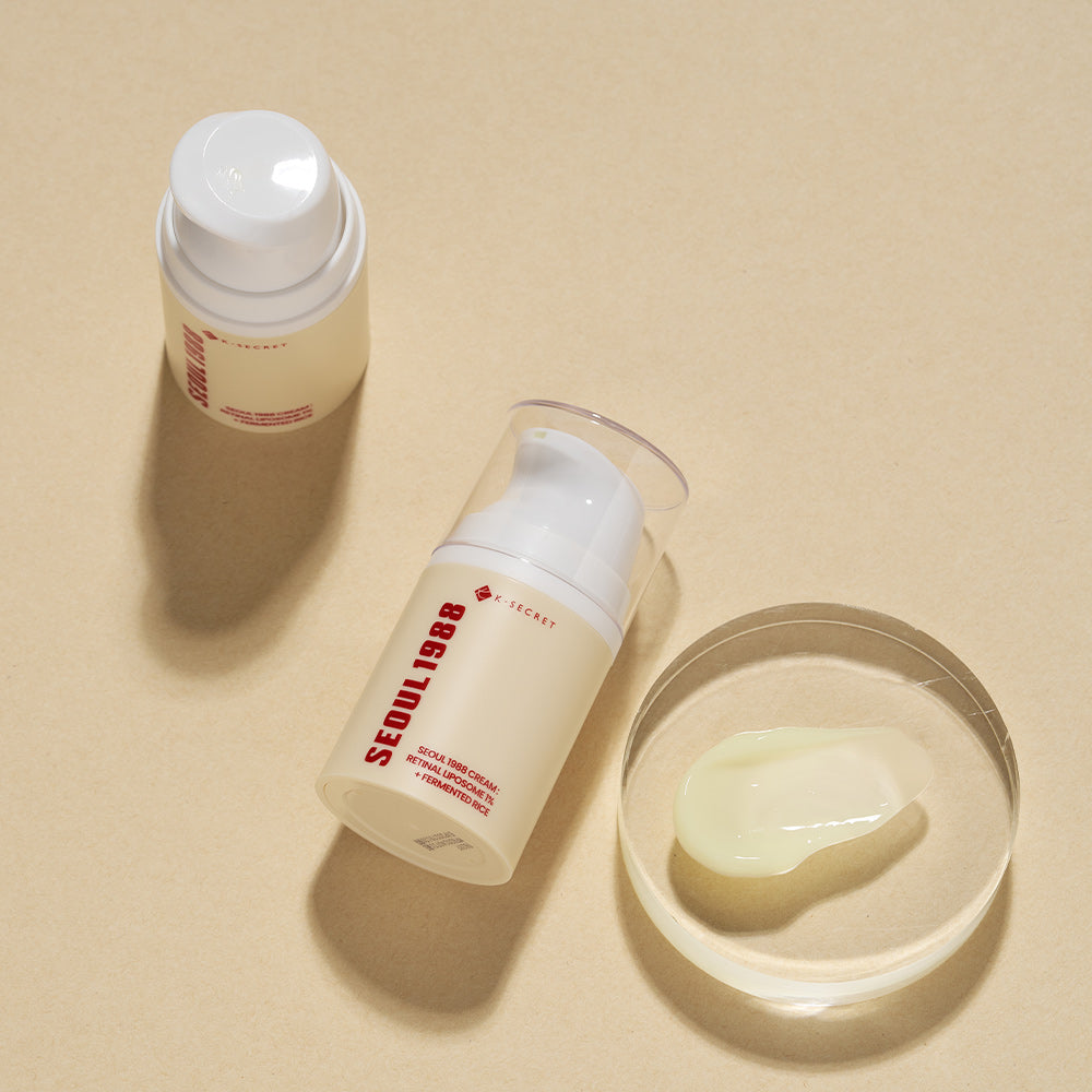 SEOUL 1988 Retinal Fermented Rice Cream in bottles with cream in a dish on a tan surface