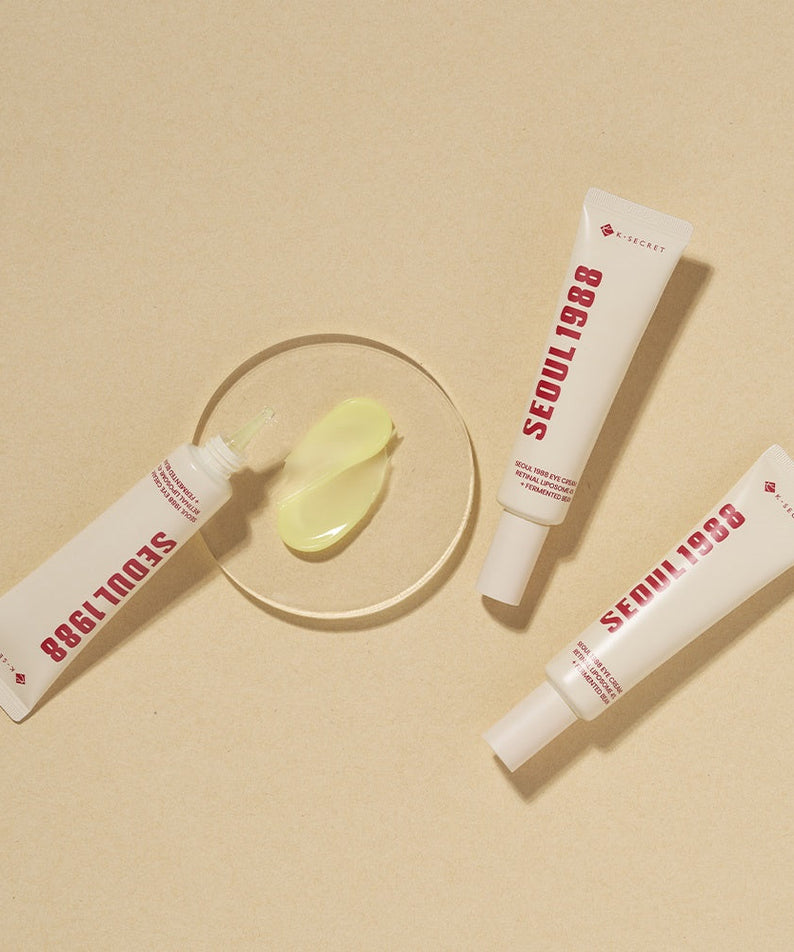 SEOUL 1988 Retinal Fermented Soybean Eye Cream tubes and product smear on beige background.
