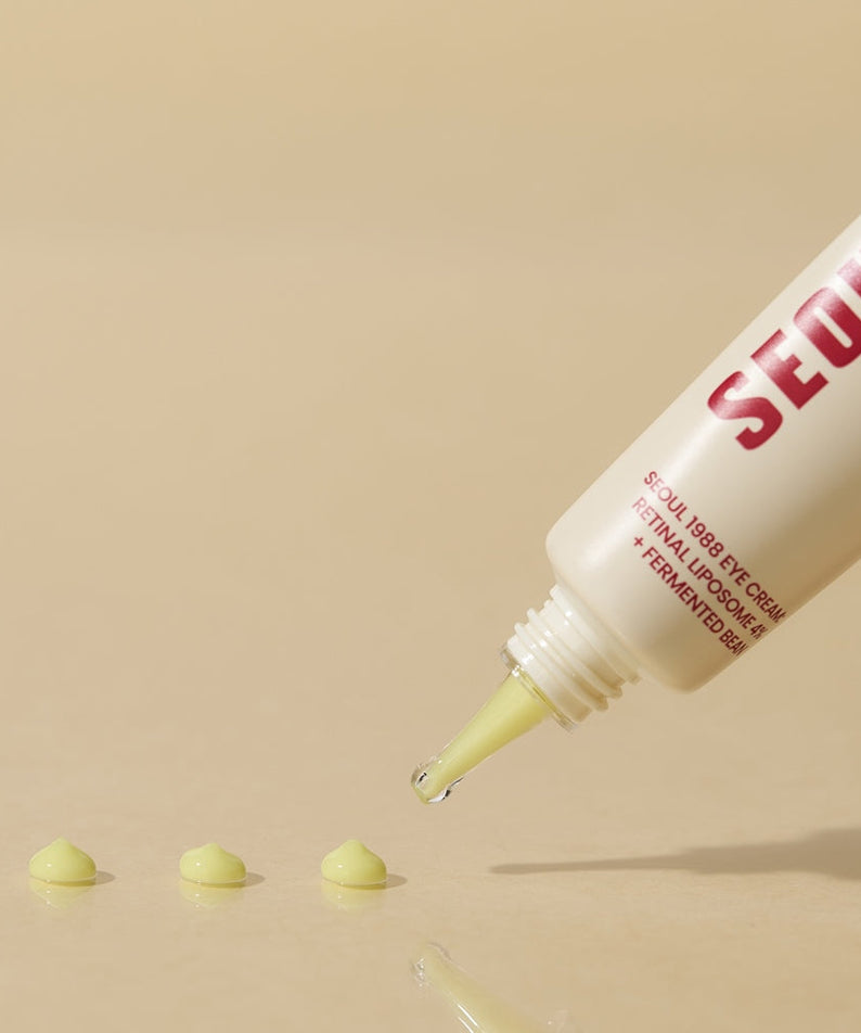 SEOUL 1988 Retinal Fermented Soybean Eye Cream tube dispensing product on a smooth surface