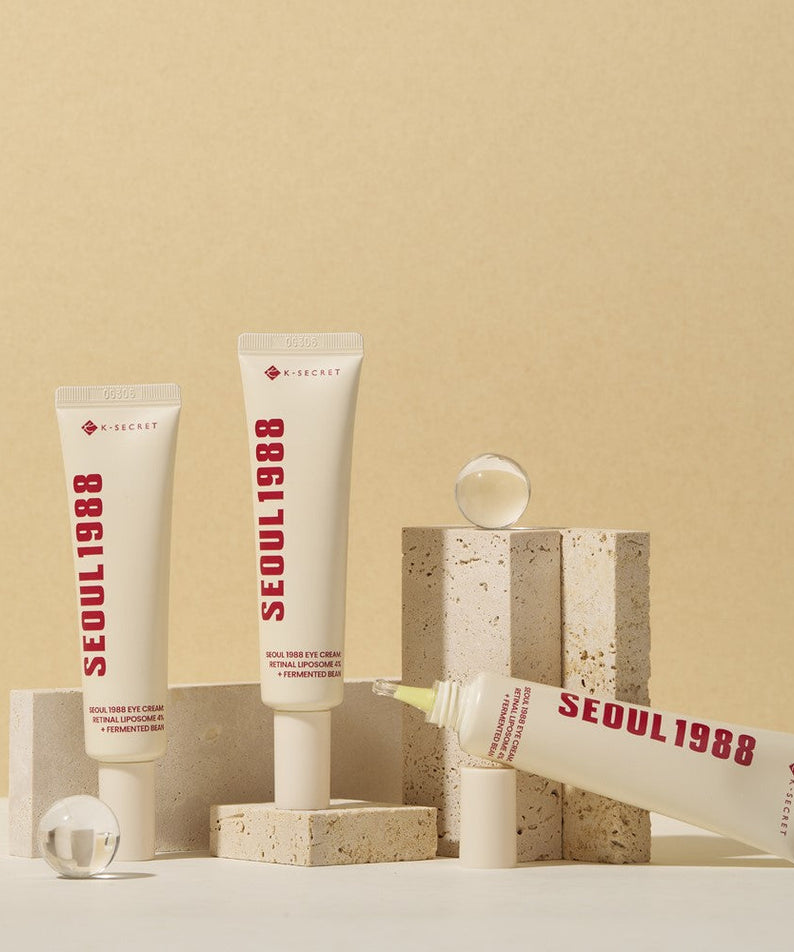 SEOUL 1988 Retinal Fermented Soybean Eye Cream tubes displayed on blocks for skincare product promotion.