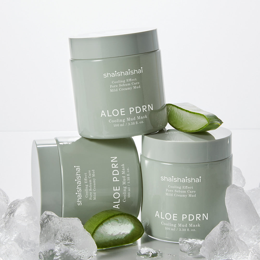 SHAISHAISHAI [1+1]Aloe PDRN Cooling Mud Mask 100ml jars surrounded by aloe vera and ice, showcasing the cooling and soothing effect