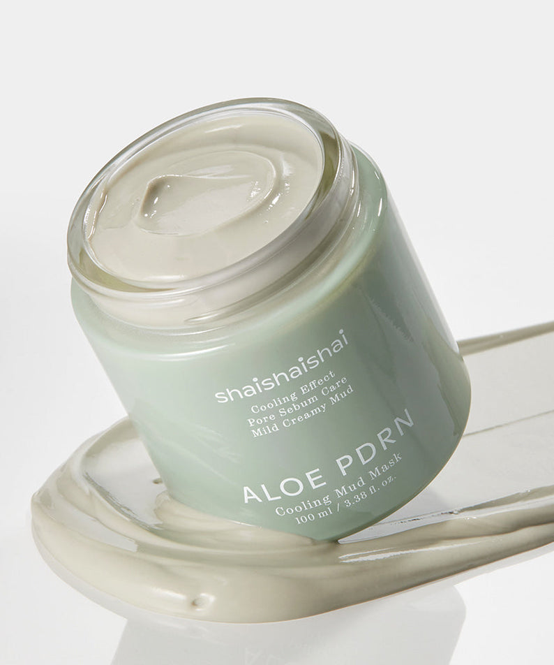 SHAISHAISHAI [1+1]Aloe PDRN Cooling Mud Mask 100ml, open jar on smeared mask texture