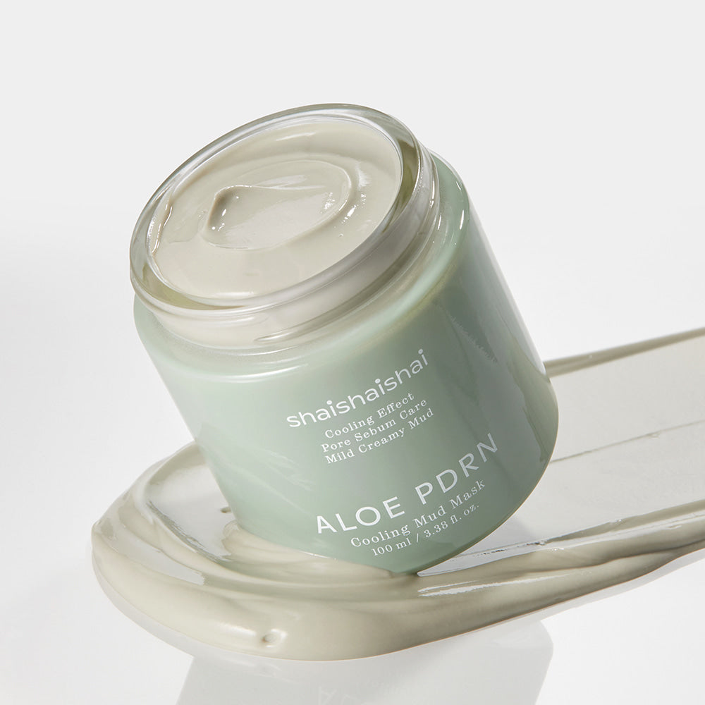SHAISHAISHAI [1+1]Aloe PDRN Cooling Mud Mask 100ml, open jar on smeared mask texture