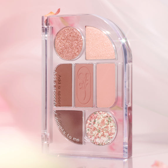 SIM;PLAIN Eye Palette with shimmer and matte shades in a sleek, compact design for versatile eye makeup looks.