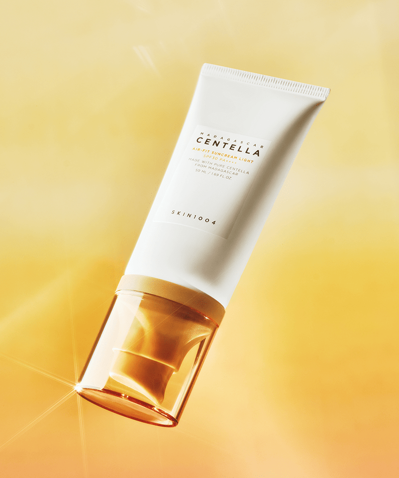 Image of SKIN1004 Madagascar Centella Air-fit Sunscreen Light 50ml against a golden background.
