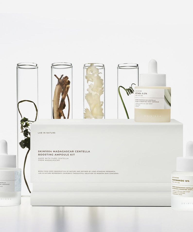 Image of SKIN1004 Madagascar Centella Boosting Ampoule Kit with ampoules and ingredients display.