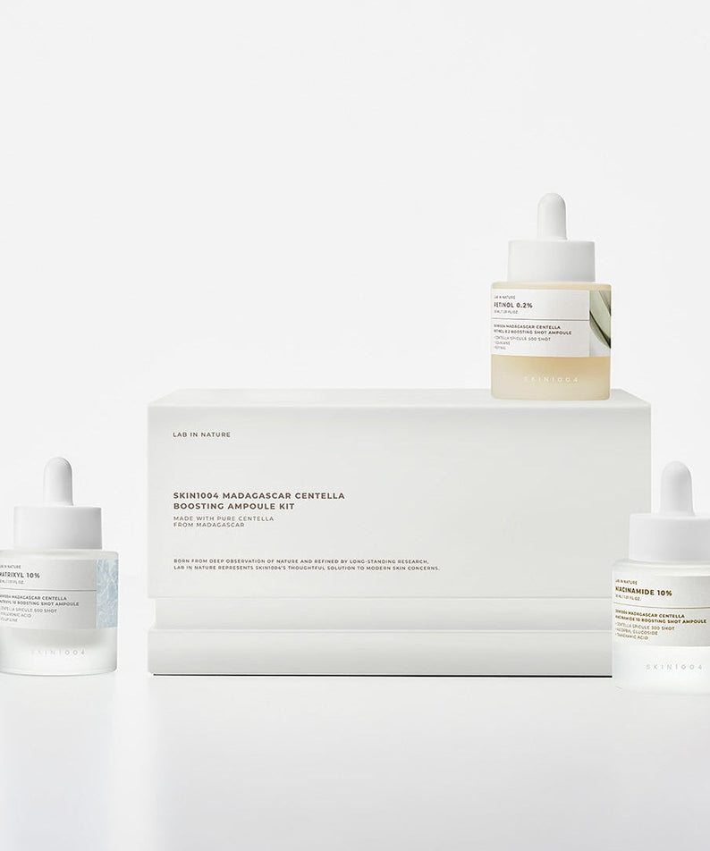 SKIN1004 Madagascar Centella Boosting Ampoule Kit displayed with three ampoules and a box.