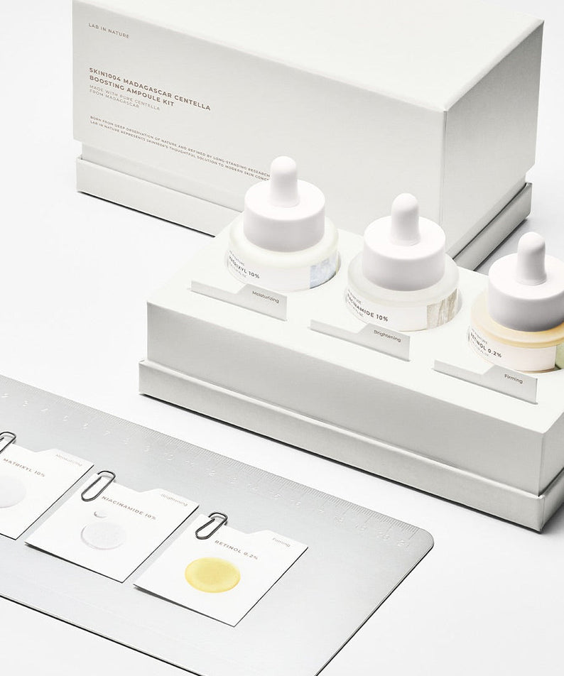 SKIN1004 Madagascar Centella Boosting Ampoule Kit displayed in a white packaging with sample sachets.