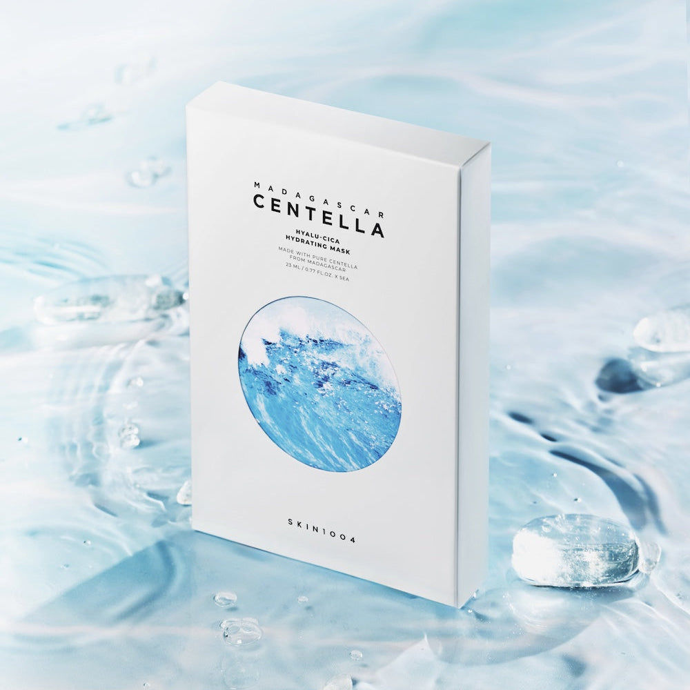 SKIN1004 Madagascar Centella Hyalu-Cica Acid Hydrating Mask 23ml [5 sheets] packaging on a watery background
