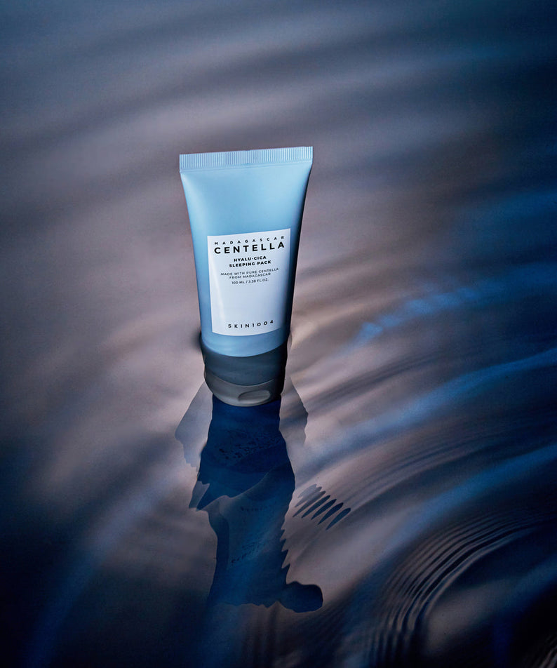 SKIN1004 Madagascar Centella Hyalu-Cica Acid Sleeping Pack 100ml in a serene blue water background.