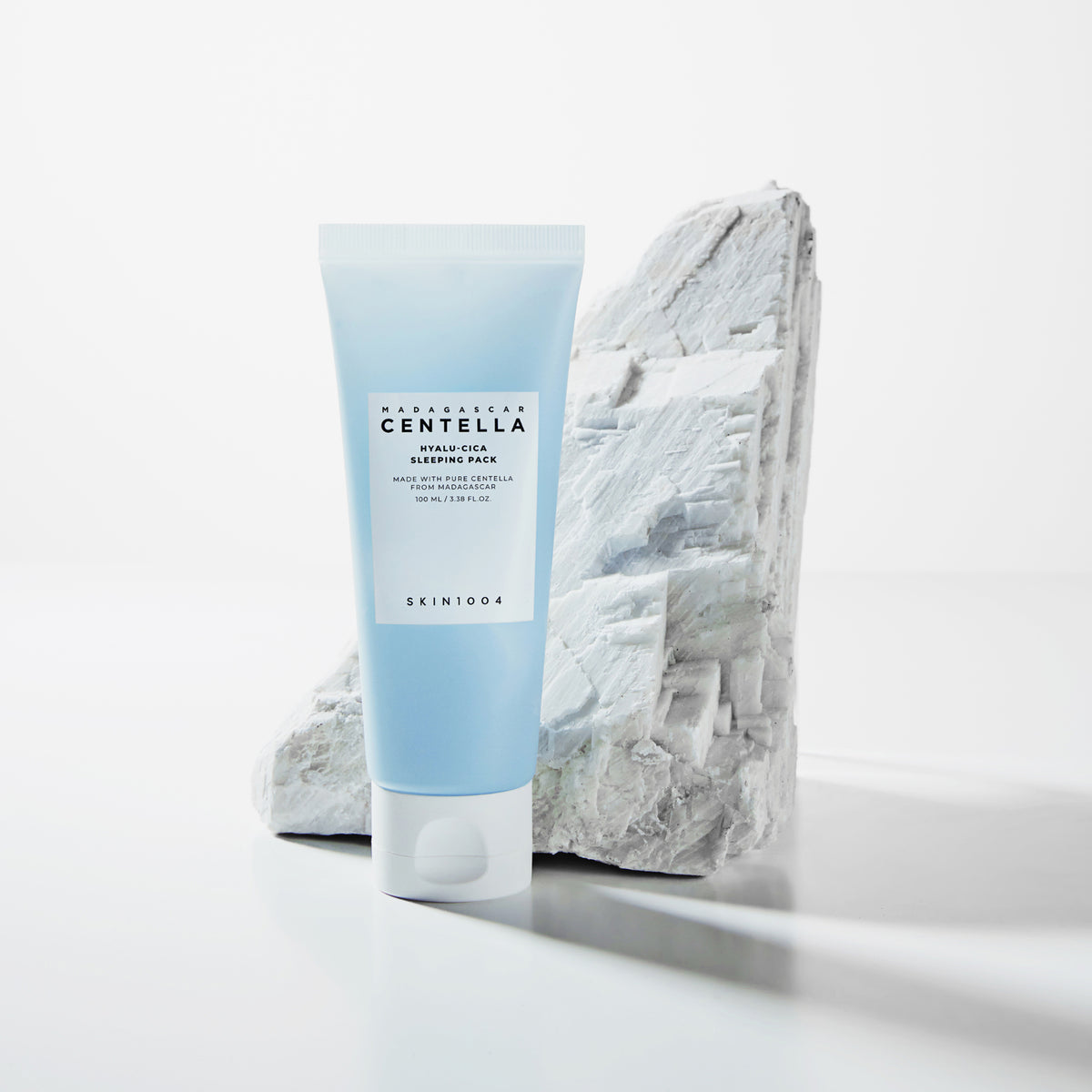 SKIN1004 Madagascar Centella Hyalu-Cica Acid Sleeping Pack 100ml tube with rock background