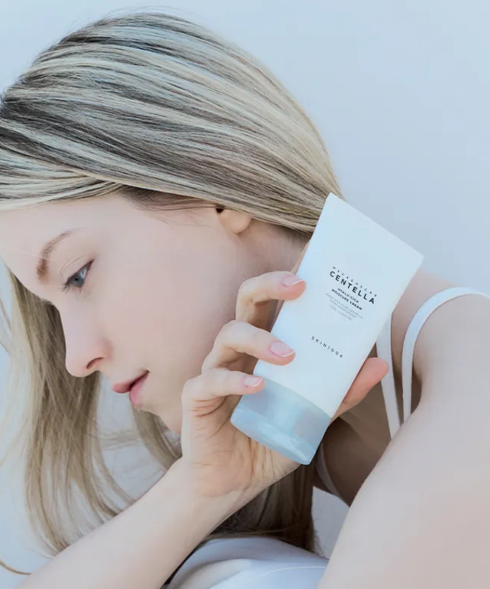 Woman holding SKIN1004 Madagascar Centella Hyalu-Cica Moisture Cream 75ml