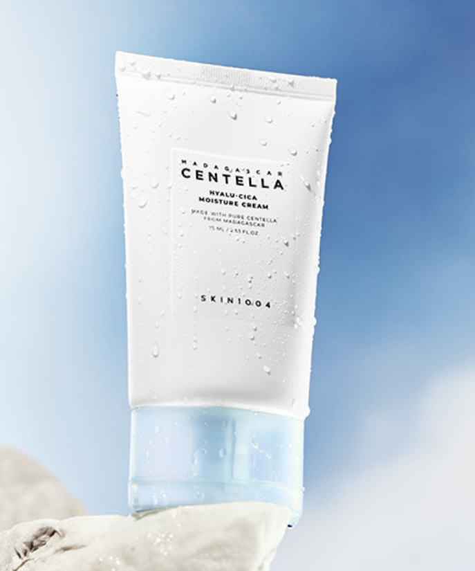 SKIN1004 Madagascar Centella Hyalu-Cica Moisture Cream 75ml on a smooth rock with a blue sky background