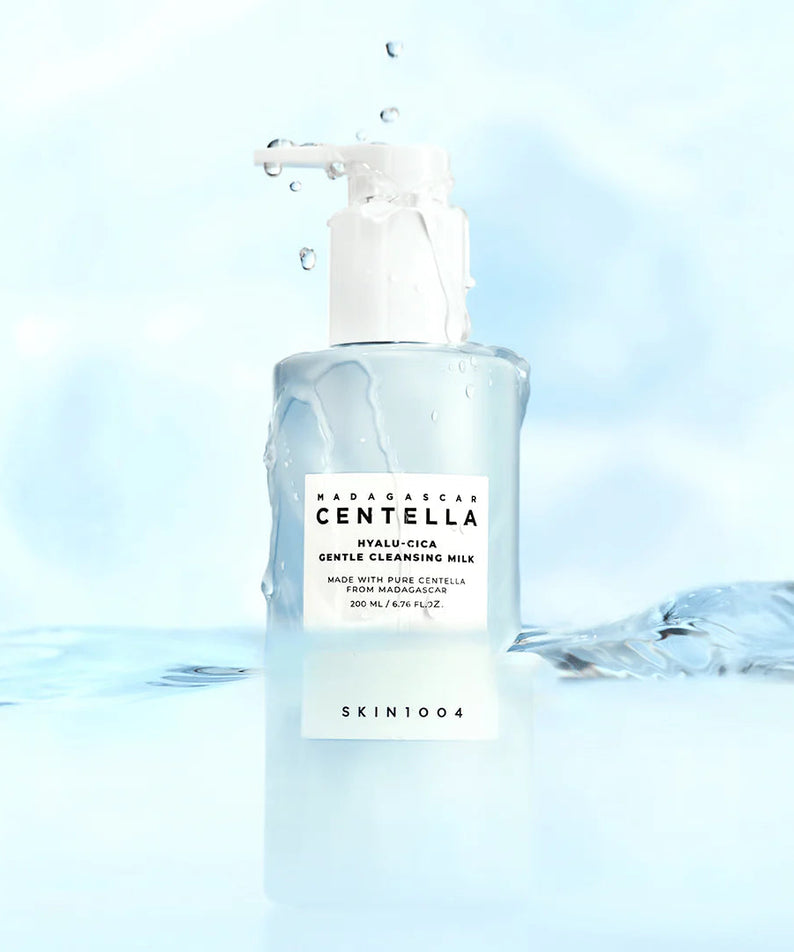 SKIN1004 Madagascar Centella Hyalur-Cica Gentle Cleansing Milk 200ml bottle on a watery background