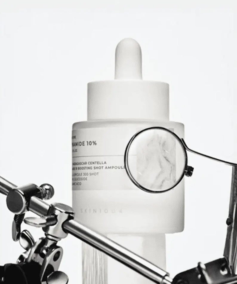 SKIN1004 Madagascar Centella Niacinamide 10 Boosting Shot Ampoule 30ml with magnifying glass on label